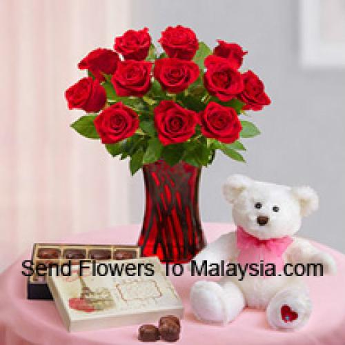 12 belles roses avec un ours en peluche et des chocolats